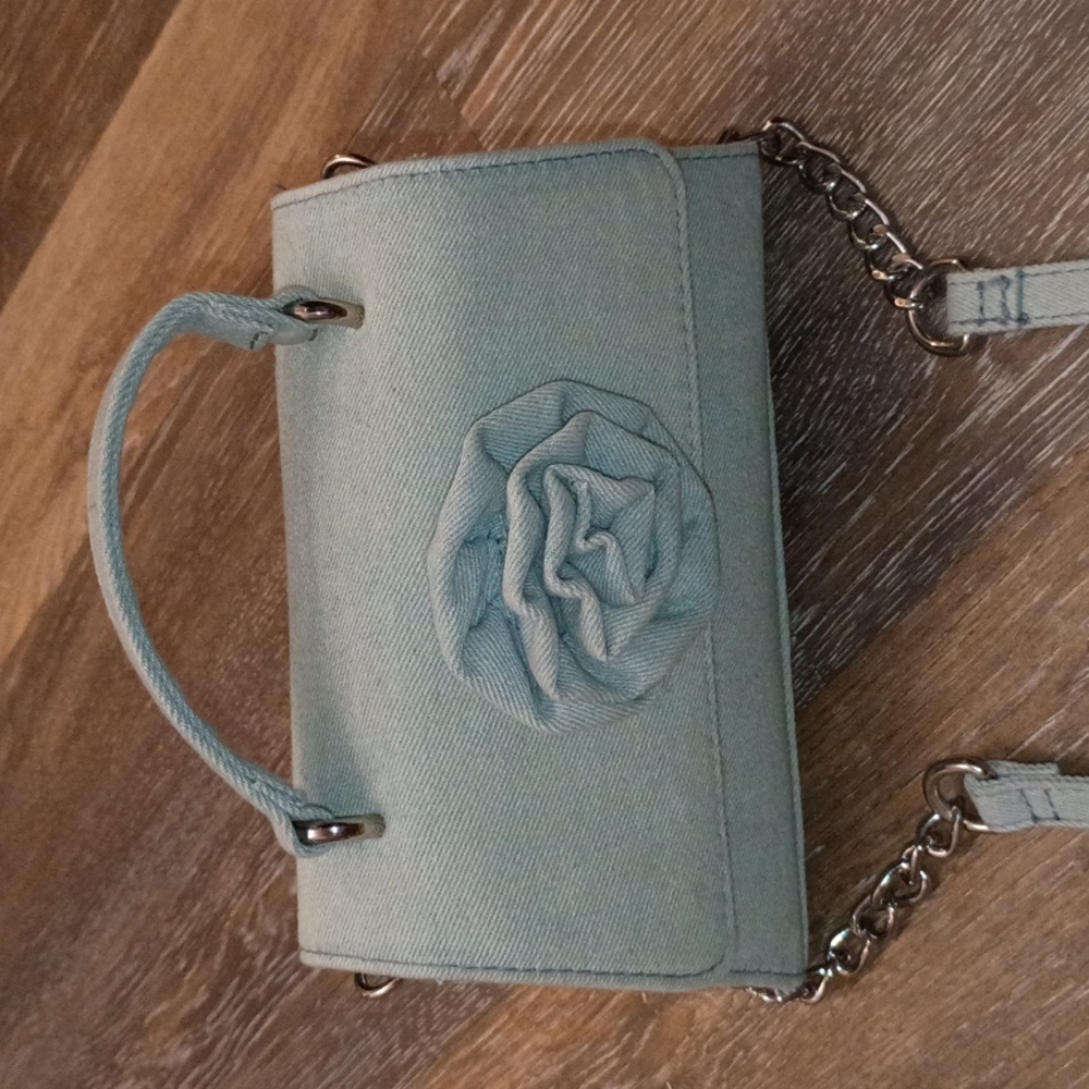 Madden NYC. Chic Blue Crossbody Bag with Floral Detail.
